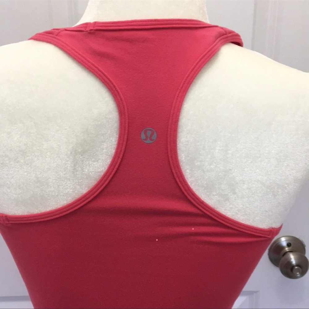 Lululemon pink Razorback tank.